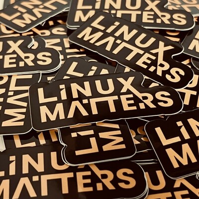 A photo of some Linux Matters stickers